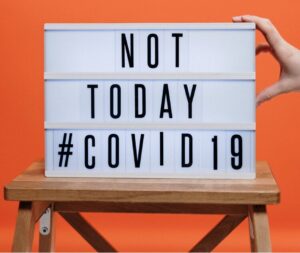 A letter board sign that reads "NOT TODAY #COVID 19"