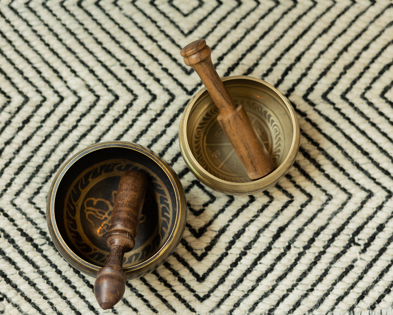 Cincinnati-DBT-mindfulness-bowls Two mindfulness bowls sitting on a printed background at Cincinnati Center for DBT