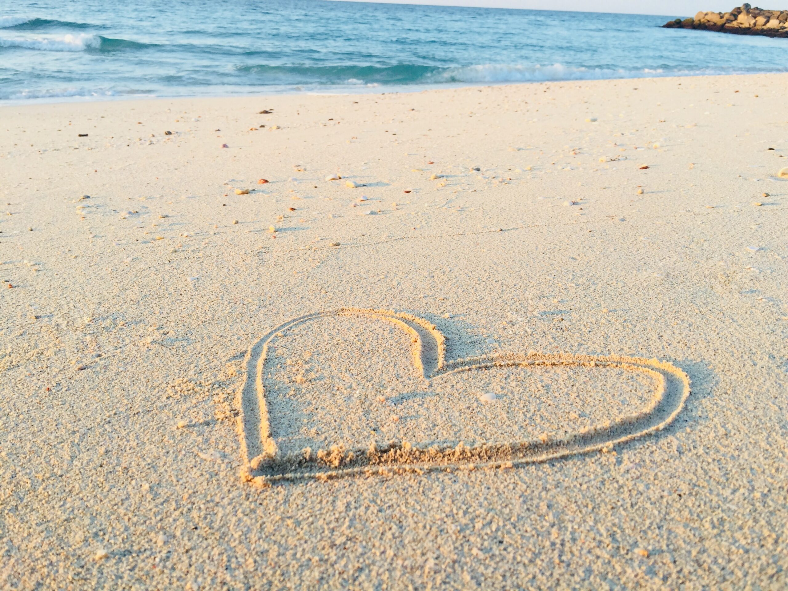 Heart drawn in the sand