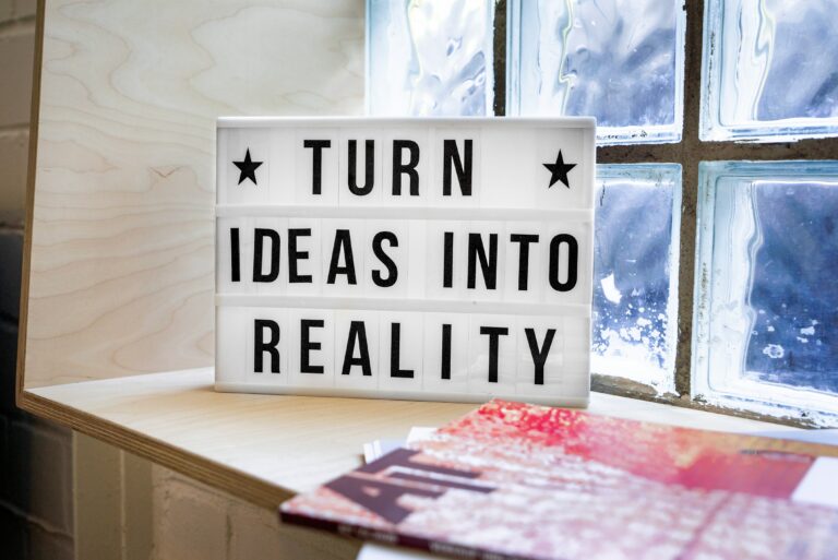 Sign reading "Turn ideas into reality"