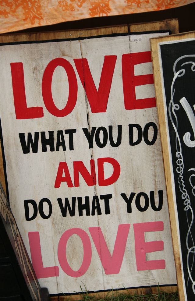Sign reading "love what you do and do what you love"