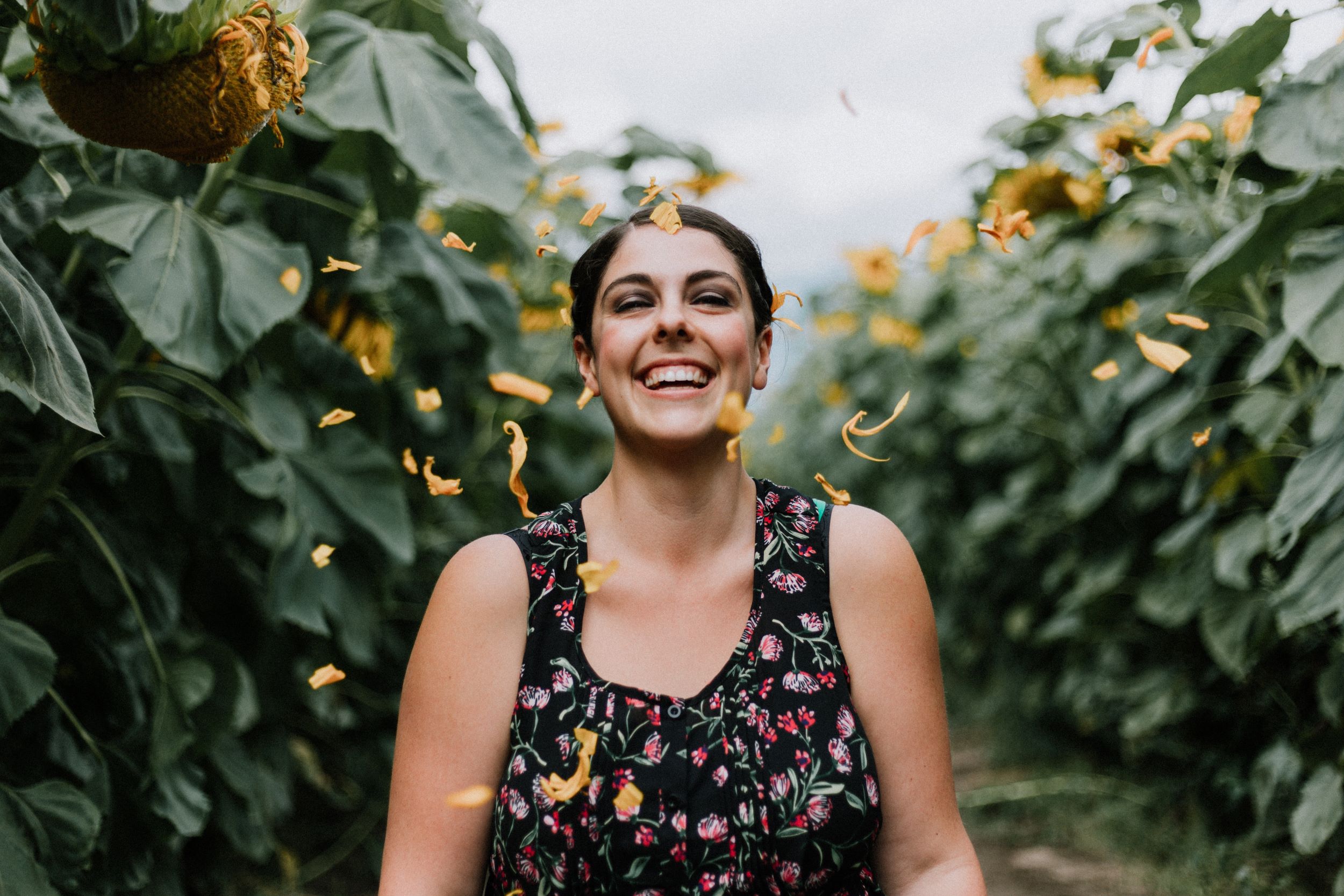 woman happy flowers self love