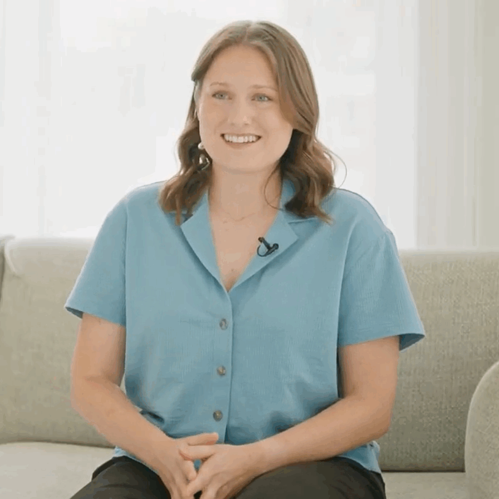 Cincinnati DBT Psychology Trainee Emma Pierce smiles at the camera while discussing her passion for working with clients with suicidal histories and borderline personality disorder (BPD)